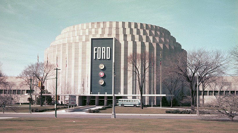 A white round building with the word Ford on it the Ford Rotunda
