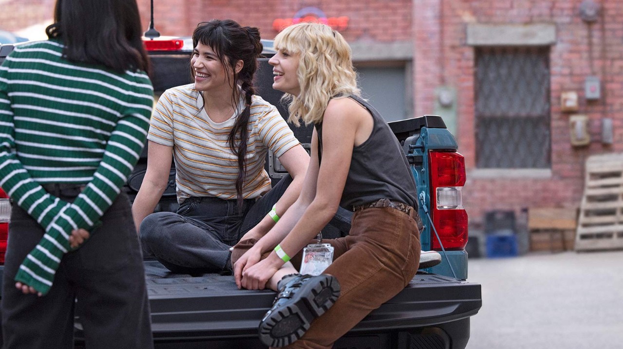 Friends gathering in pickup bed