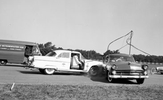 Black and white photo of an automobile crash test
