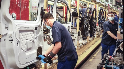 Ford employees working on production line
