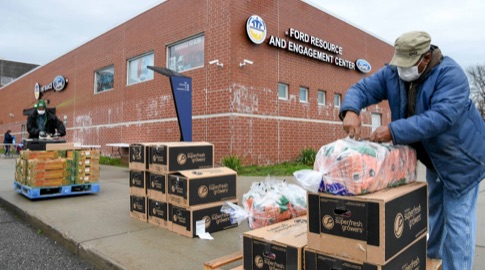 Ford volunteers unpacking COVID-19 supplies