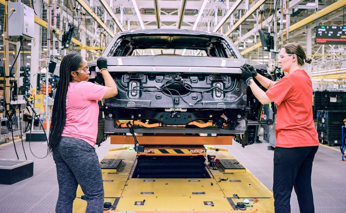 All electric Ford Transit with line workers